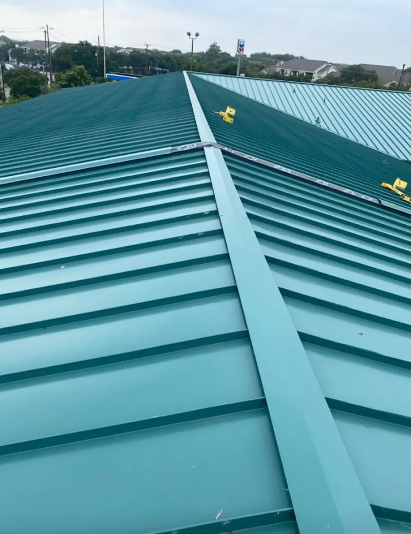 Green commercial metal roof ridge and valley for Metal Roof Repair in Kalifornsky